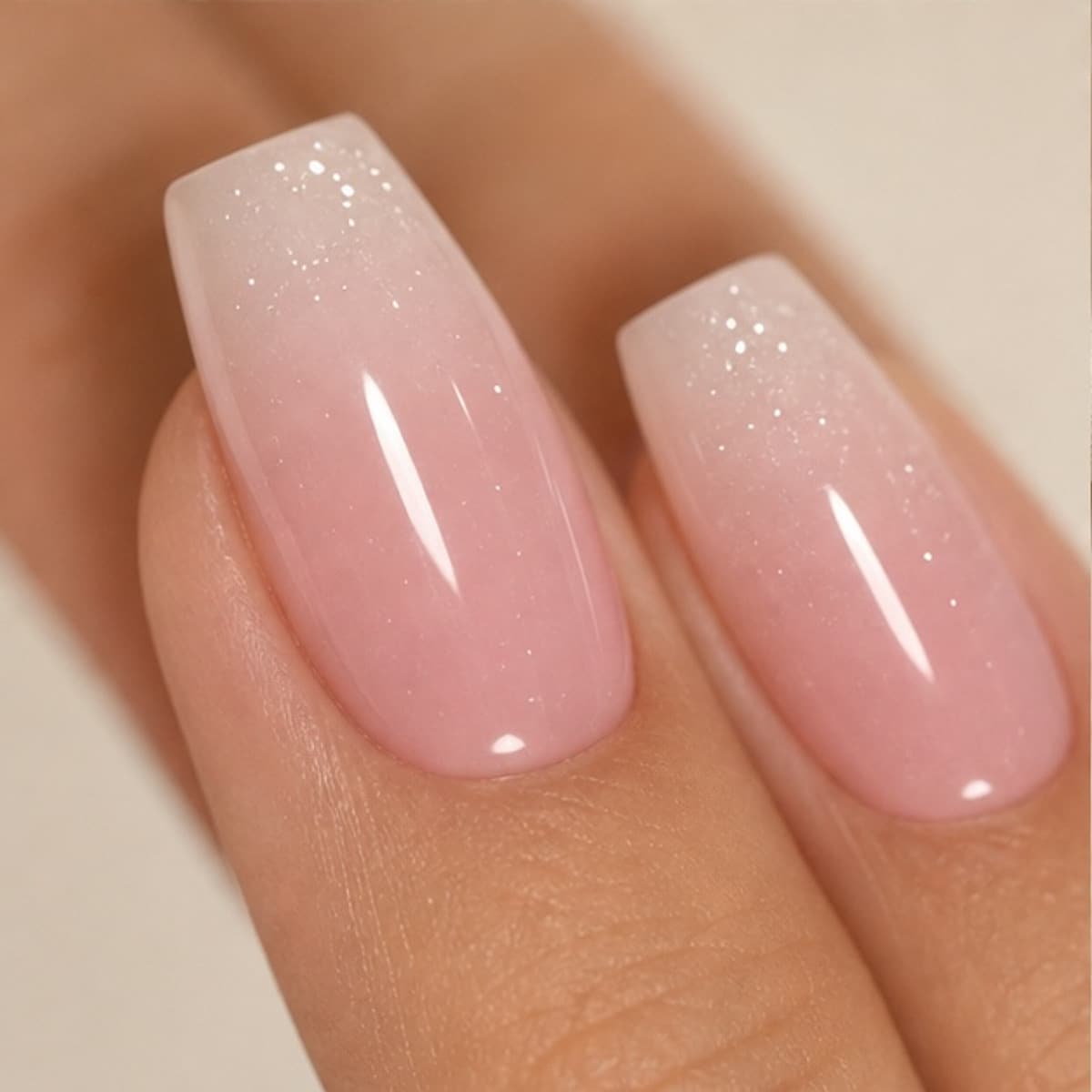Macro detail of the Nacre blush shimmer manicure