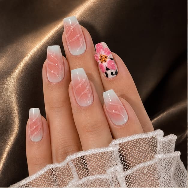 Héritage sculpted lily manicure on warm brown silk