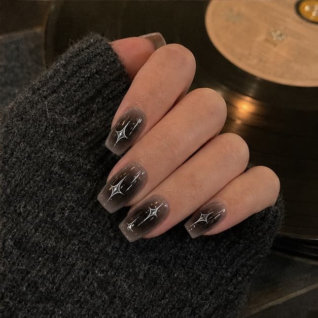 Nocturne press-on nails in a warm everyday style diary scene